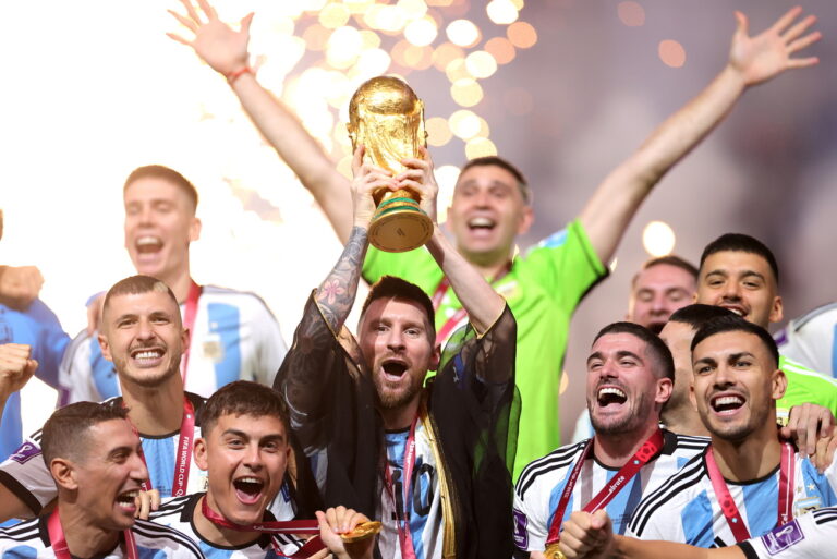 epa10373028 Lionel Messi of Argentina lifts the trophy after Argentina won the FIFA World Cup 2022 Final between Argentina and France at Lusail stadium, Lusail, Qatar, 18 December 2022. EPA/Friedemann Vogel