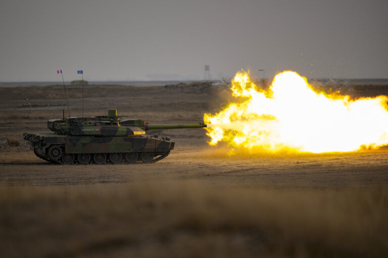 A French Leclerc main battle tank shoots during an exercise at a training range in Smardan, eastern Romania, Wednesday, Jan. 25, 2023. Around 600 French soldiers deployed to Romania as part of a NATO battlegroup on the alliance's eastern flank carried out live combat exercises on Wednesday to test their preparedness amid Russia's ongoing war in neighboring Ukraine. (AP Photo/Vadim Ghirda)