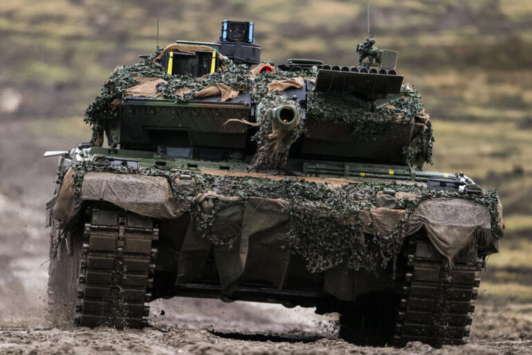 epa10442766 A 'Leopard 2 A6' battle tank in action during a visit of German Defense Minister Pistorius (not pictured) to German armed forces Bundeswehr soldiers of the tank battalion 203 in Augustdorf, Germany, 01 February 2023. According to the German government's decision to supply 14 Leopard 2 tanks to Ukraine, Pistorius got informed about the performance of the weapon system. EPA/FRIEDEMANN VOGEL