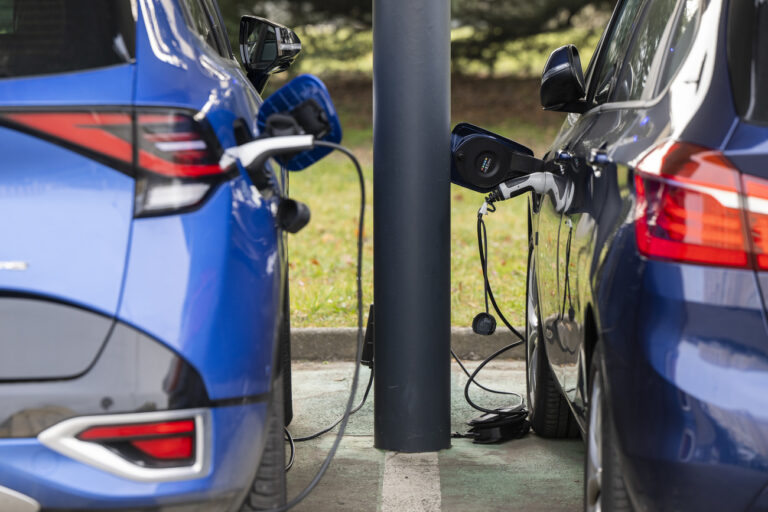 Two electric cars are charging at one of the charging stations at the European headquarters of the United Nations in Geneva, Switzerland, Wednesday, February 22, 2023. (KEYSTONE/Martial Trezzini)