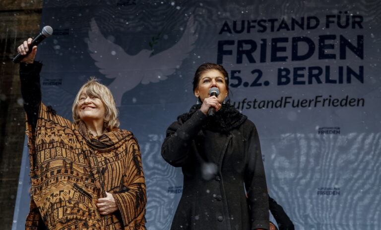 epa10490240 Women's rights activist and publisher Alice Schwarzer (L) and Sahra Wagenknecht (R) of Germany's The Left party Die Linke, speak during the demonstration 'Uprising for Peace' in front of the Brandenburg gate in Berlin, Germany, 25 February 2023. Russian troops entered Ukrainian territory on 24 February 2022, starting a conflict that has provoked destruction and a humanitarian crisis. One year on, fighting continues in many parts of the country. EPA/HANNIBAL HANSCHKE