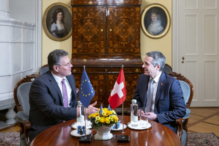 Swiss Federal Councilor Ignazio Cassis, right, welcomes Maros Sefcovic, Vice-President of the European Commission during a working visit in Bern, Switzerland, on Wednesday, March 15, 2023. (KEYSTONE/Peter Schneider)