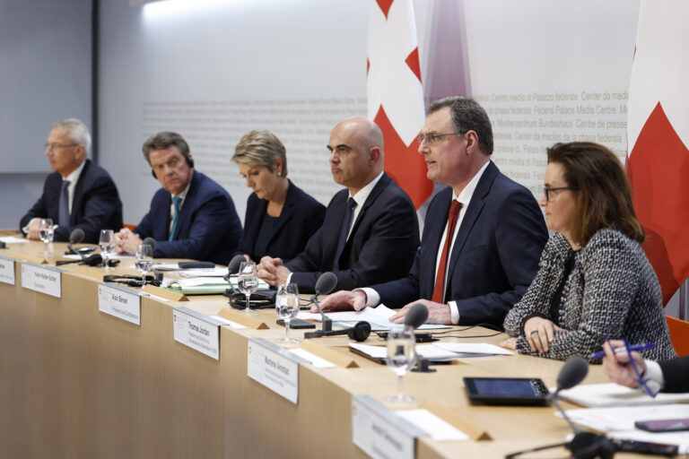 Axel Lehmann, Chairman Credit Suisse, Colm Kelleher, Chairman UBS, Swiss Finance Minister Karin Keller-Sutter, Swiss Federal President Alain Berset, Thomas J. Jordan, Chairman Swiss National Bank, and Marlene Amstad, President FINMA, back to front, attend a press conference, on Sunday, 19 March 2023 in Bern. Switzerland's largest bank UBS agreed to take over Credit Suisse for 3 billion Swiss francs ($3.25 billion) in a government-brokered deal over the weekend following days of market upheaval over the health of the banking sector. (KEYSTONE/Peter Klaunzer)