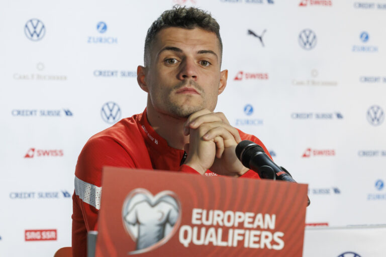 Switzerland's midfielder Granit Xhaka speaks to the media, during a press conference of the national soccer team Switzerland one day before the UEFA Euro 2024 qualifying group I soccer match between Switzerland and Israel, at the Stade de Geneve, in Geneva, Switzerland, Monday, March 27, 2023. (KEYSTONE/Salvatore Di Nolfi)