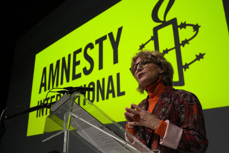 Amnesty International director general Agnes Callamard delivers her speech Monday, March 27, 2023 in Paris. Human rights organization Amnesty International says the international solidarity shown to the people of Ukraine should be a blueprint for global conflict, not the exception. In its annual report released Tuesday March 28, 2023, Amnesty International said repression against protesters was on the rise, along with other human rights violations. (AP Photo/Michel Euler)