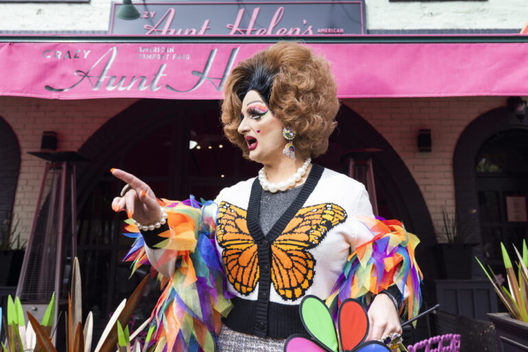 epa10565158 Drag Queen performer Tara Hoot prepares to attend a Drag Story Hour event at Crazy Aunt Helen's Restaurant in Washington, DC, USA, 08 April 2023. Volunteers, some with the Rainbow Defense Coalition, used umbrellas to block anti-trans protesters' views of people entering the event. Anti-LGBTQ protestors have recently targeted Drag Story Hours, during which a drag performer reads stories to children and adults. EPA/JIM LO SCALZO