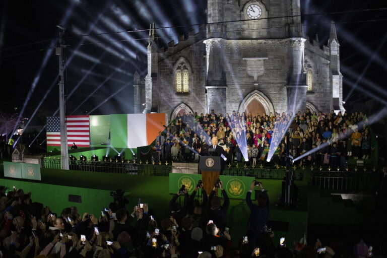 epa10573090 US President Joe Biden delivers a speech outside St. Muredach's Cathedral in Ballina, Ireland, 14 April 2023. Ballina in County Mayo is President Biden's Irish ancestral town. Biden's great-great-great grandfather left Ballina for Pennsylvania in the 1850s. It is also the final leg of his four-day visit to Northern Ireland and the Republic of Ireland to mark the 25th anniversary of the Good Friday Agreement. EPA/TOLGA AKMEN