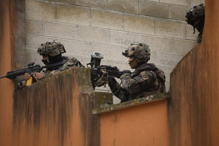 epa10598666 French soldiers are on a watch from a rooftop during the 4th phase of the 'Orion 23' military drill inside the Jeoffrecourt village training centre at the Sissonne Military Camp, eastern France, 29 April 2023. The 4th part of the Orion military exercise runs from 19 April to 05 May 2023 with 12,000 soldiers from France, Belgium, Britain, Spain, Germany, Greece and the US. EPA/YOAN VALAT