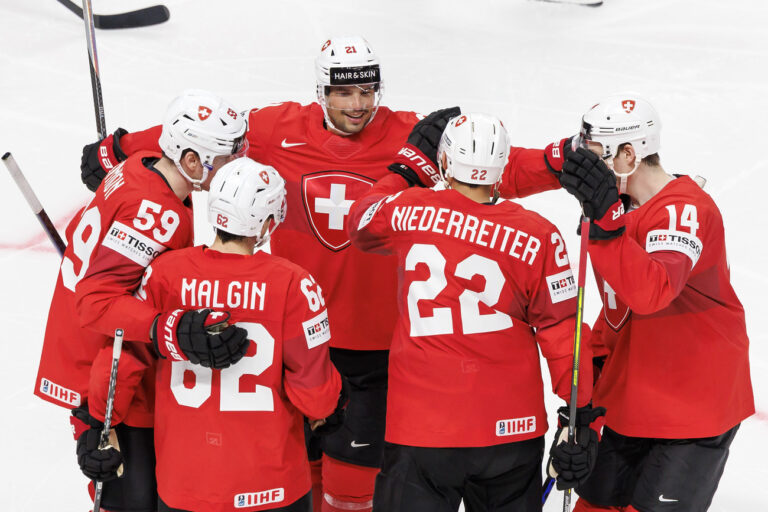 Switzerland's forward Nino Niederreiter #22 celebrates his goal with his teammates Switzerland's forward Dario Simion #59, Switzerland's forward Denis Malgin #62, Switzerland's forward Kevin Fiala #21 and Switzerland's defender Dean Kukan #14, after scoring the 4:0, during the IIHF 2023 World Championship preliminary round group B game between Switzerland and Kazakhstan, at the Riga Arena, in Riga, Latvia, Tuesday, May 16, 2023. (KEYSTONE/Salvatore Di Nolfi)