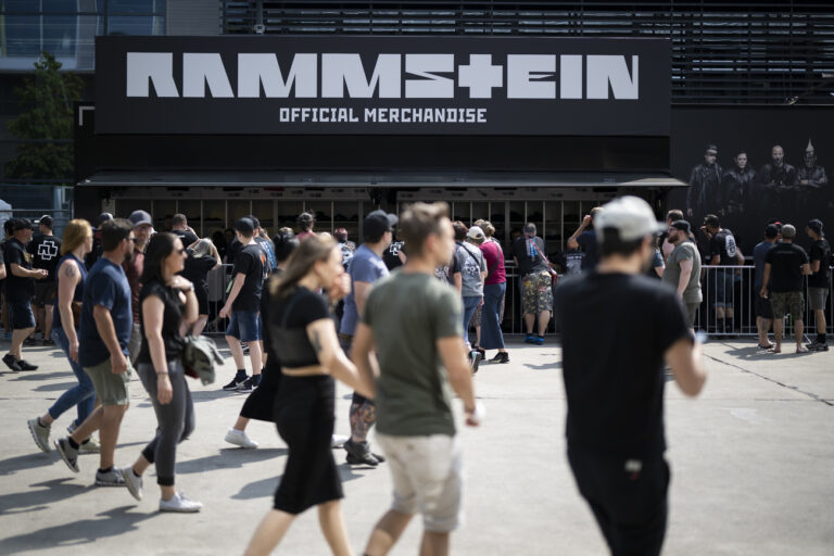 People arrive for a concert of German band Rammstein at the Wankdorf Stadion, in Bern, Switzerland, on Saturday, June 17, 2023. Despite sexual abuse accusations against the band's lead singer Till Lindemann, the concerts in Bern do take a place for 17-18 June. (KEYSTONE/Anthony Anex)
