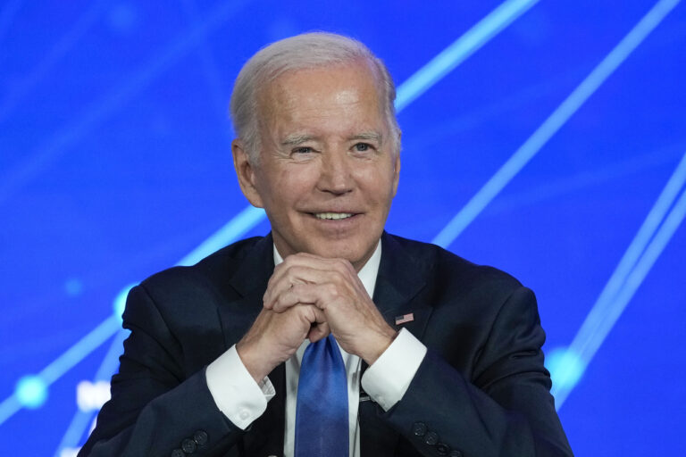 President Joe Biden smiles as members of the media leave the room and ask questions about his son Hunter Biden, during a discussion on managing the risks of Artificial Intelligence during an event in San Francisco, Tuesday, June 20, 2023. (AP Photo/Susan Walsh)