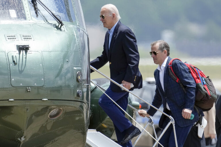 President Joe Biden boards Marine One with his son Hunter Biden as he leaves Andrews Air Force Base, Md., on his way to Camp David, Saturday, June 24, 2023. (AP Photo/Manuel Balce Ceneta)