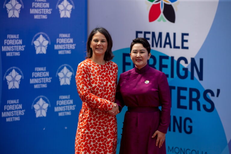 epa10716658 Mongolian Foreign Minister Battsetseg Batmunkh (R) shake hands with German Foreign Minister Annalena Baerbock as she arrives for the Female Foreign Ministers' Meeting at the State House in Ulaanbaatar, Mongolia, 29 June 2023. Mongolia is hosting the first Female Foreign Ministers' Meeting from 29 to 30 June 2023. EPA/BYAMBASUREN BYAMBA-OCHIR