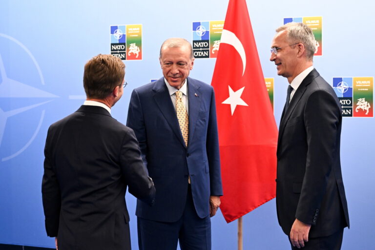 epa10738011 Turkish President Recep Tayyip Erdogan (C) shakes hands with Swedish Prime Minister Ulf Kristersson (L) as the Secretary General of NATO Jens Stoltenberg (R) looks on during their meeting ahead of the NATO ​summit in Vilnius, Lithuania, 10 July 2023. The NATO Summit will take place in Vilnius on 11 and 12 July 2023 with the alliance's leaders expected to adopt new defense plans. EPA/FILIP SINGER / POOL