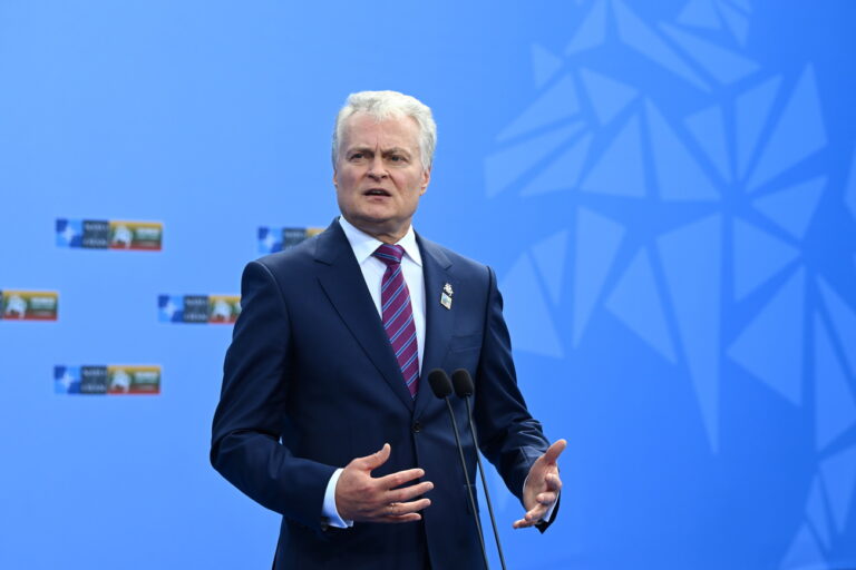 epa10738949 Lithuania's President Gitanas Nauseda speaks to the media as he arrives to attend the NATO summit in Vilnius, Lithuania, 11 July 2023. The North Atlantic Treaty Organization (NATO) Summit will take place in Vilnius on 11 and 12 July 2023 with the alliance's leaders expected to adopt new defense plans. EPA/FILIP SINGER