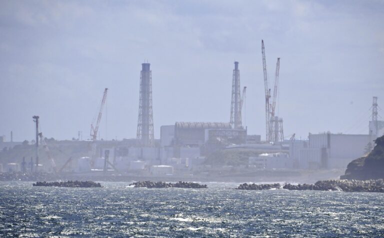 The Fukushima Daiichi nuclear power plant is seen in Namie, Fukushima prefecture, northern Japan, Thursday, Aug. 24, 2023. The operator of the tsunami-wrecked Fukushima Daiichi nuclear power plant says it has begun releasing its first batch of treated radioactive water into the Pacific Ocean — a controversial step, but a milestone for Japan's battle with the growing radioactive water stockpile.(Kyodo News via AP)