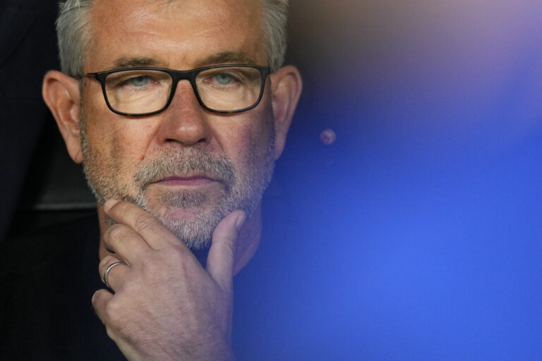 Union's head coach Urs Fischer rubs his chin before the Champions League group C soccer match between Real Madrid and FC Union Berlin at the Santiago Bernabeu stadium in Madrid, Wednesday, Sept. 20, 2023. (AP Photo/Manu Fernandez)