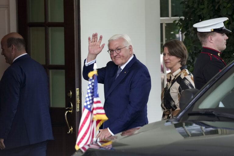 Germany's President Frank-Walter Steinmeier waves as he arrives outside the West Wing of the White House in Washington for a meeting with President Joe Biden, Friday, Oct. 6, 2023. (AP Photo/Susan Walsh)