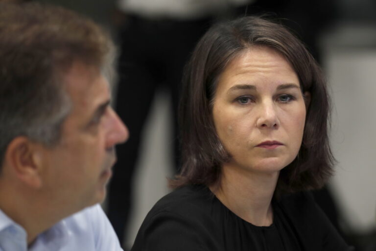 epa10916641 German Foreign Minister Annalena Baerbock (R) attends a press conference with her Israeli counterpart Eli Cohen during a visit to the command center of the city of Netivot, near border with the Gaza Strip, in southern Israel, 13 October 2023. Baerbock is in Israel on a one‑day visit to 'underscore' the German Government's solidarity with Israel, the German Foreign Ministry said. EPA/ATEF SAFADI