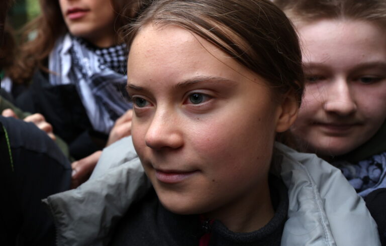 epa10976057 Swedish environmental activist Greta Thunberg departs Westminster Magistrates Court in London, Britain, 15 November 2023. Thunberg pleaded not guilty to a public order offence charge at a London protest. The campaigner was arrested on 17 October 2023 whilst protesting outside the Energy Intelligence Forum. EPA/ANDY RAIN