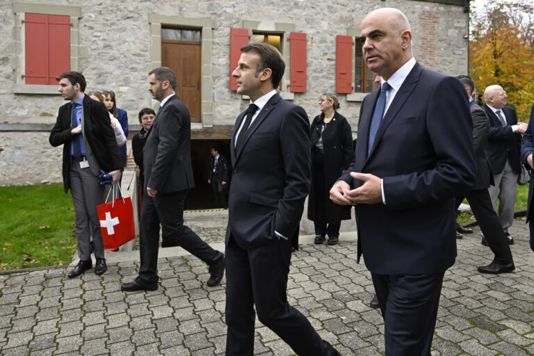 French President Emmanuel Macron, 2nd right, and Swiss President Alain Berset, right, leave the Jean Monnet Foundation for Europe, in Lausanne, Switzerland, Thursday, November 16, 2023. French President Macron and his wife Brigitte are visiting Switzerland for a two day state visit. (KEYSTONE/POOL/Martial Trezzini)