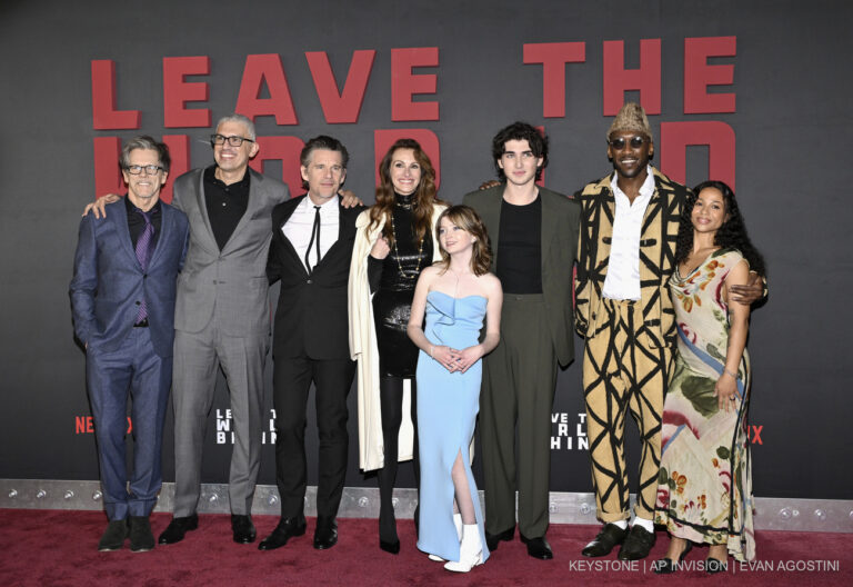 From left, Kevin Bacon, Sam Esmail, Ethan Hawke, Julia Roberts, Farrah Mackenzie, Charlie Evans, Mahershala Ali and Myha'la Herrold pose together at the premiere of Netflix's 