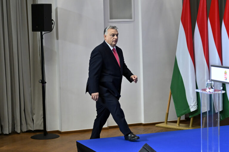 Hungarian Prime Minister Viktor Orban arrives for an annual international press conference in Budapest, Hungary, Thursday, Dec. 21, 2023. (AP Photo/Denes Erdos)