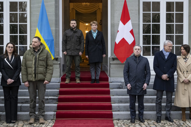 Swiss Federal President Viola Amherd, center right, and Volodymyr Zelenskyy, President of Ukraine, center left, as well as from right, Christine Schraner Burgener, state secretary for migration, Beat Jans, minister of justice, and Federal Councillor Ignazio Cassis, foreign minister, and from left, Yulia Svyrydenko, First Deputy Prime Minister of Ukraine, and Andriy Yermak, head of the Ukrainian President's Office, stand for the photographers, on Monday, January 15, 2024 in Kehrsatz near Bern, Switzerland. Zelenskyy will attend the World Economic Forum in Davos starting Tuesday. (KEYSTONE/POOL/Alessandro della Valle)