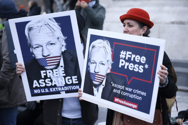 People demonstrate to support Julian Assange, Tuesday , Feb.20, 2024 in Paris. Julian Assange's lawyers opened a final U.K. legal challenge Tuesday in London to stop the WikiLeaks founder from being sent to the United States to face spying charges, arguing that American authorities are seeking to punish him for exposing serious criminal acts by the U.S. state (AP Photo/Thomas Padilla)