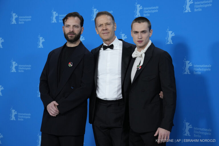 From left, actors Alessandro Borghi, Rocco Siffredi and Saul Nanni pose for media at a photo-call for the movie 'Supersex' during the International Film Festival Berlinale, in Berlin, Germany, Thursday, Feb. 22, 2024. (AP Photo/Ebrahim Noroozi)