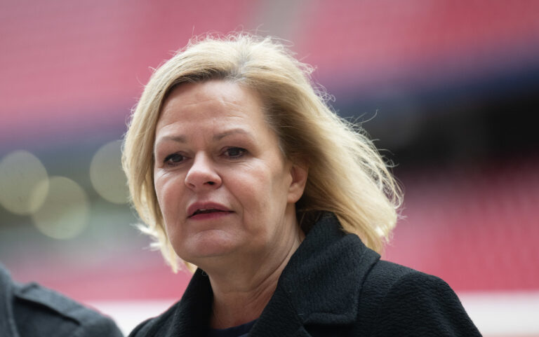 23.02.2024, Sachsen, Leipzig: Nancy Faeser (SPD), Bundesinnenministerin, steht in der RedBull Arena in Leipzig. Faeser hat Leipzig in Vorbereitung auf die UEFA EURO 2024 besucht und sich mit Vertretern von Stadt und Polizei getroffen. Thema waren der Planungsstand der Vorbereitungen sowie das Nachhaltigkeitsprojekt 