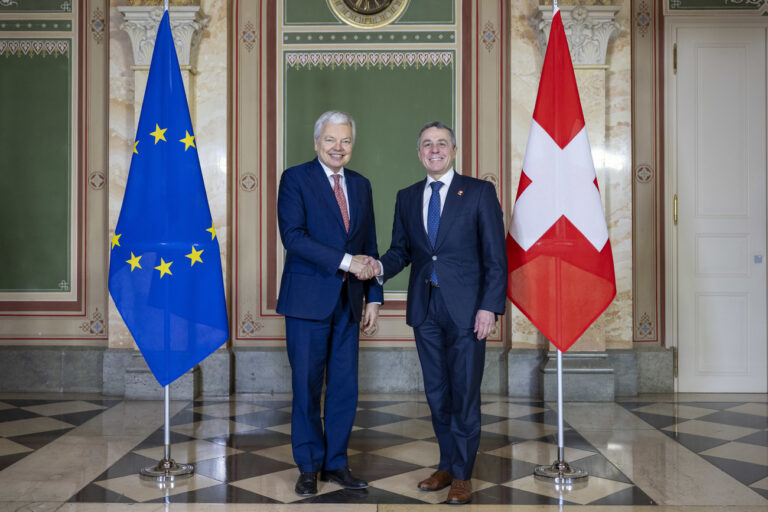 Swiss Federal Councilor Ignazio Cassis, right, welcomes Didier Reynders European Commissioner for Justice, during a .courtesy visit in Bern, Switzerland, on Thursday, March 7, 2024. (KEYSTONE/Peter Schneider)