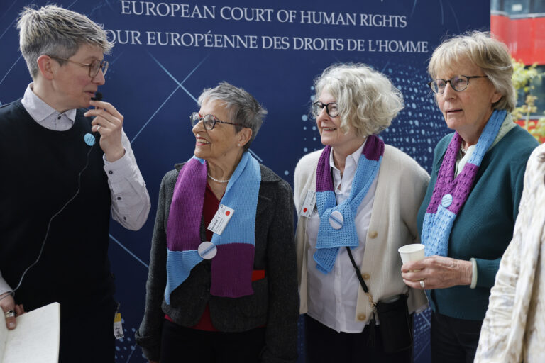 Swiss members of Senior Women for Climate gather after the European Court of Human Rights' ruling, Tuesday, April 9, 2024 in Strasbourg, eastern France. Europe's highest human rights court ruled that its member nations have an obligation to protect their citizens from the ill effects of climate change, but still threw out a high-profile case brought by six Portuguese youngsters aimed at forcing countries to reduce greenhouse gas emissions. (AP Photo/Jean-Francois Badias)