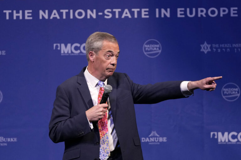 Former MEP and Honorary President of the Reform UK party Nigel Farage speaks during the National Conservatism conference in Brussels, Tuesday, April 16, 2024. (AP Photo/Virginia Mayo)