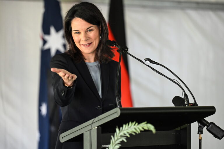 epa11315603 German Minister for Foreign Affairs Annalena Baerbock gestures during a ceremony to mark the return of four significant cultural heritage items to the Kaurna People from the collection of the Grassi Museum in Leipzig, at Possum Park/Pirltawardli in Adelaide, Australia 03 May 2024. EPA/MICHAEL ERREY AUSTRALIA AND NEW ZEALAND OUT