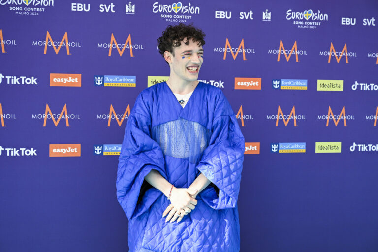 Nemo representing Switzerland poses on the turquoise carpet ahead of the opening ceremony for the 68th edition of the Eurovision Song Contest, at the Malmö Live Congress and Concert Hall, in Malmö, Sweden, Sunday, May 5, 2024. (Jessica Gow /TT News Agency via AP)