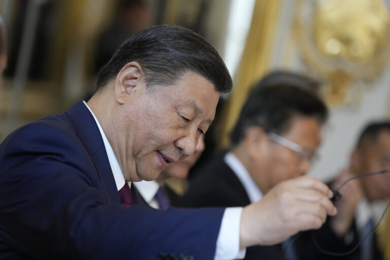 China's President Xi Jinping attends a working session with French President Emmanuel Macron, and delegates at the Elysee Palace, Monday, May 6, 2024 in Paris. China's President Xi Jinping is in France for a two-day state visit that is expected to focus both on trade disputes and diplomatic efforts to convince Beijing to use its influence to move Russia toward ending the war in Ukraine. (AP Photo/Thibault Camus, Pool)