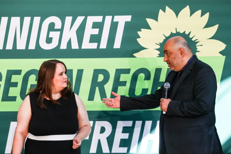 epa11336559 Germany's Green party co-chairpersons Ricarda Lang (L) and Omid Nouripour (R) speak at the kick-off campaign tour of the Greens for the European elections, in Berlin, Germany, 13 May 2024. EPA/FILIP SINGER