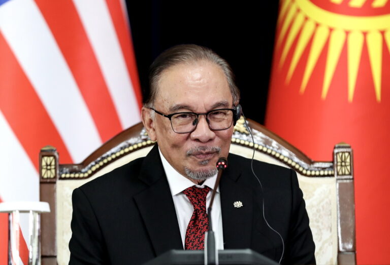 epa11341453 Malaysian Prime Minister Anwar Ibrahim attends a joint press conference with Kyrgyz President Sadyr Japarov (not pictured) in Bishkek, Kyrgyzstan, 15 May 2024. Malaysian Prime Minister Anwar Ibrahim is on an official visit to Kyrgyzstan. EPA/IGOR KOVALENKO