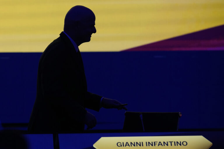 FIFA President Gianni Infantino walks back to his seat after delivering his speech at the FIFA Congress in Bangkok, Thailand, Friday, May 17, 2024. (AP Photo/Sakchai Lalit)