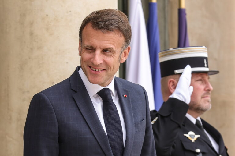 epa11347701 French President Emmanuel Macron (L) reacts as he waits for the arrival of Danish Prime Minister Mette Frederiksen (not pictured) at the Elysee Palace in Paris, France, 17 May 2024. EPA/TERESA SUAREZ