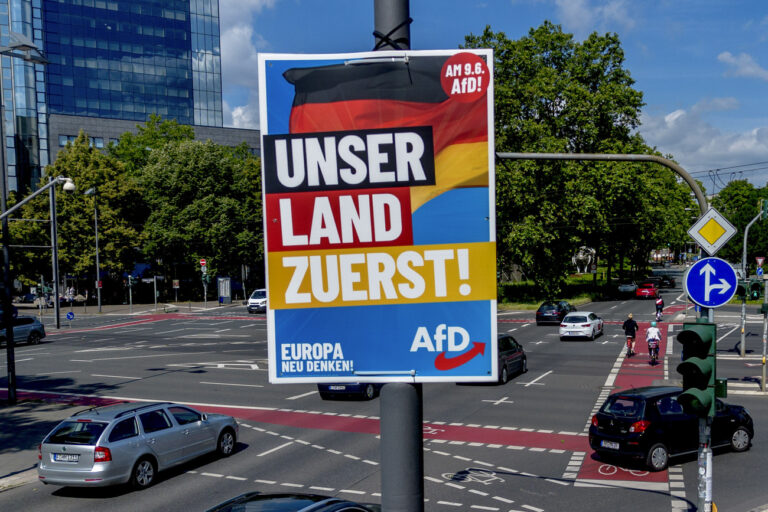 An election poster of German far right AfD party is fixed on a lamp pole in Frankfurt, Germany, Monday, June 10, 2024. (AP Photo/Michael Probst)