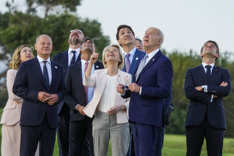 From right, French President Emmanuel Macron, U.S. President Joe Biden, Japan's Prime Minister Fumio Kishida, Canada's Prime Minister Justin Trudeau, European Commission President Ursula von der Leyen, Britain's Prime Minister Rishi Sunak, European Council President Charles Michel, German Chancellor Olaf Scholz and Italian Prime Minister Giorgia Meloni watch a skydiving demo during the G7 world leaders summit at Borgo Egnazia, Italy, Thursday, June 13, 2024. (AP Photo/Luca Bruno)