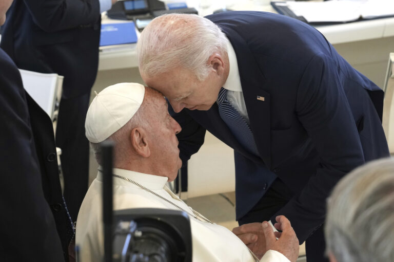 U.S. President Joe Biden, right, greets Pope Francis ahead of a working session on Artificial Intelligence (AI), Energy, Africa-Mediterranean, on day two of the 50th G7 summit at Borgo Egnazia, southern Italy, on Friday, June 14, 2024. (Christopher Furlong/Pool Photo via AP)