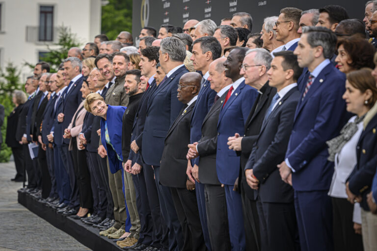 Heads of states pose for a traditional family photo as Swiss Federal President Viola Amherd leans forward during the Summit on peace in Ukraine, in Stansstad near Lucerne, Switzerland, Saturday, June 15, 2024. Heads of state from around the world gather on the Buergenstock Resort in central Switzerland for the Summit on Peace in Ukraine, on June 15 and 16. (KEYSTONE/EDA/POOL/Alessandro della Valle)