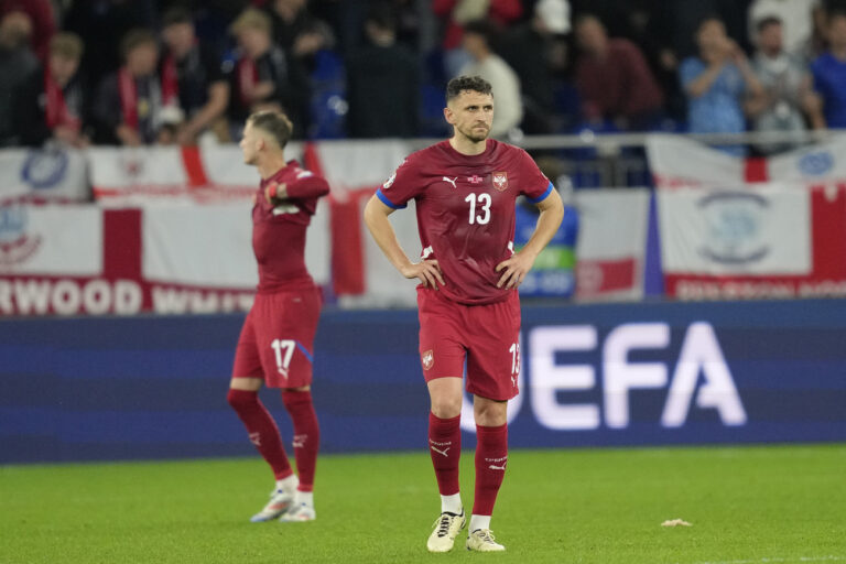 Serbia's Milos Veljkovic is dejected at the end of a Group C match between Serbia and England at the Euro 2024 soccer tournament in Gelsenkirchen, Germany, Sunday, June 16, 2024. (AP Photo/Andreea Alexandru)