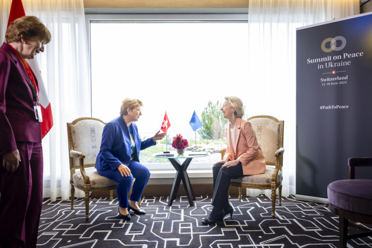 Swiss Federal President Viola Amherd, left, speaks to Ursula von der Leyen President of European Commission, right, as Amherd's Personal Counsellor Brigitte Hauser-Sueess, left, stands next to her, as they meet for a bilateral talk during the Summit on peace in Ukraine, in Stansstad near Lucerne, Switzerland, Saturday, June 15, 2024. Heads of state from around the world gather on the Buergenstock Resort in central Switzerland for the Summit on Peace in Ukraine, on June 15 and 16. (KEYSTONE/EDA/POOL/Michael Buholzer)