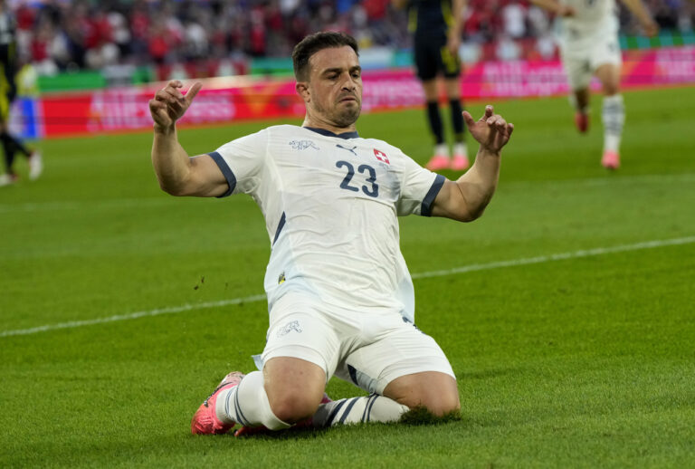 Switzerland's Xherdan Shaqiri celebrates his side's equalising goal during a Group A match between Scotland and Switzerland at the Euro 2024 soccer tournament in Cologne, Germany, Wednesday, June 19, 2024. (AP Photo/Martin Meissner)