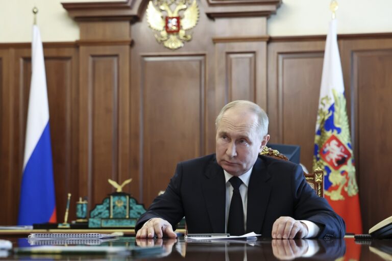 Russian President Vladimir Putin listens to Vladimir Saldo, the Moscow-appointed head of the Russian-controlled Kherson region of Ukraine, during their meeting at the Kremlin in Moscow, Russia, Tuesday, June 25, 2024. (Vyacheslav Prokofyev, Sputnik, Kremlin Pool Photo via AP)