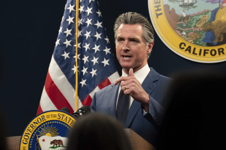 FILE - California Gov. Gavin Newsom answers a reporters question about his revised 2024-25 state budget during a news conference in Sacramento, Calif., Friday, May 10, 2024. Newsom used his State of the State address on Tuesday, June 25, 2024, to boost President Joe Biden ahead of Thursday's pivotal presidential debate, comparing Donald Trump's version of the Republican Party to the rise of fascism prior to World War II and offering Democrats' ideals as 